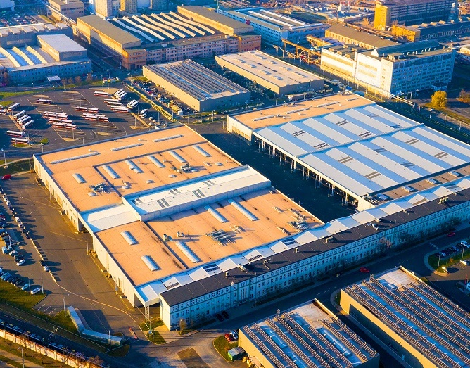 Aerial view to industrial zone and technology park from above